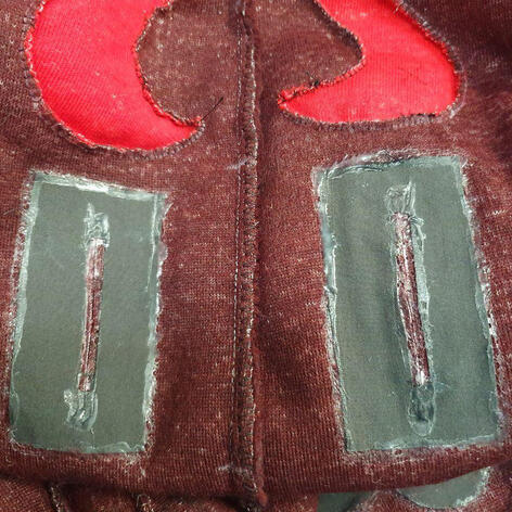 Tail belt hole reinforcement